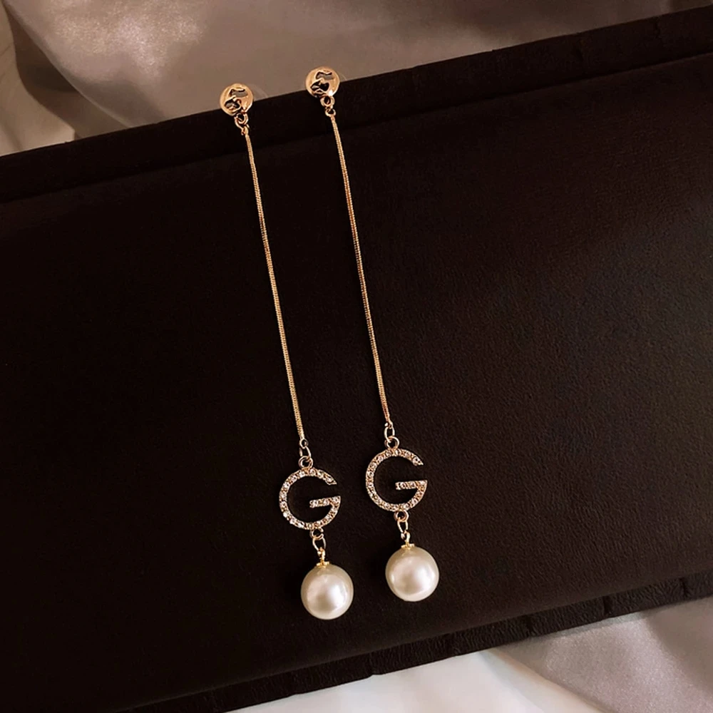 Luxury Letter G Link Chain Dangle Earrings Imitation Pearl Crystal Alphabet Brand Ear Studs Bar Long Thread Earring for Women
Luxury Letter G Link Chain Dangle Earrings Imitation Pearl Crystal Alphabet Brand Ear Studs Bar Long Thread Earring for Women