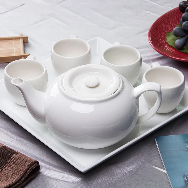 Custom Logo Ceramic Porcelain Chinese White Teapot Set with Round or Square Tray and 4pcs cups with handle
Custom Logo Ceramic Porcelain Chinese White Teapot Set with Round or Square Tray and 4pcs cups with handle