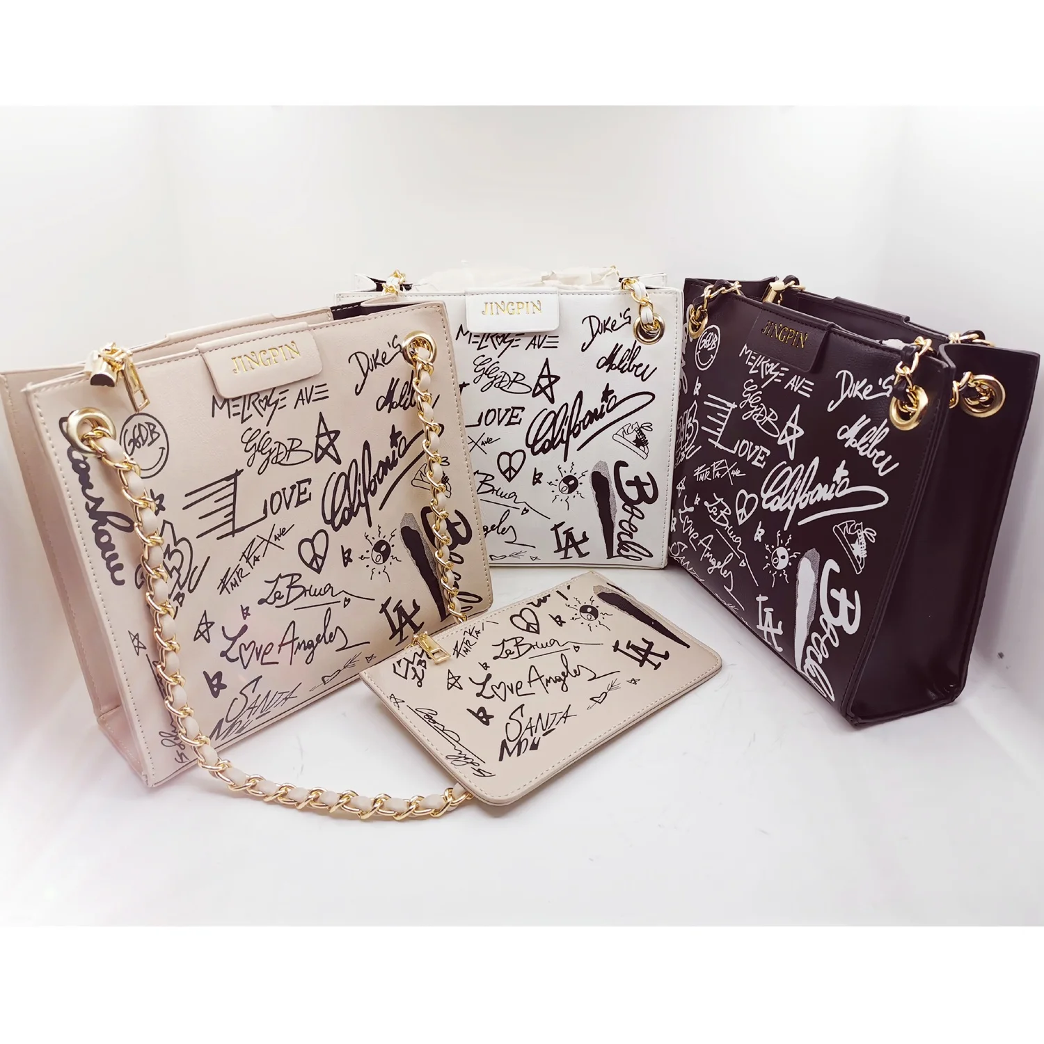 Large promotional big capacity ladies graffiti PU purses handbag 2 pcs set for women shoulder single chain bags
Large promotional big capacity ladies graffiti PU purses handbag 2 pcs set for women shoulder single chain bags