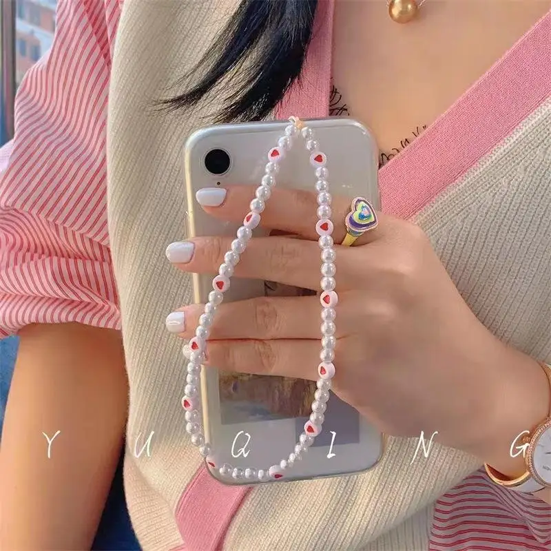 New Original Elegant Pearl Red Heart Bead Phone Chain Strap Best Selling Phone Accessories 2022
New Original Elegant Pearl Red Heart Bead Phone Chain Strap Best Selling Phone Accessories 2022