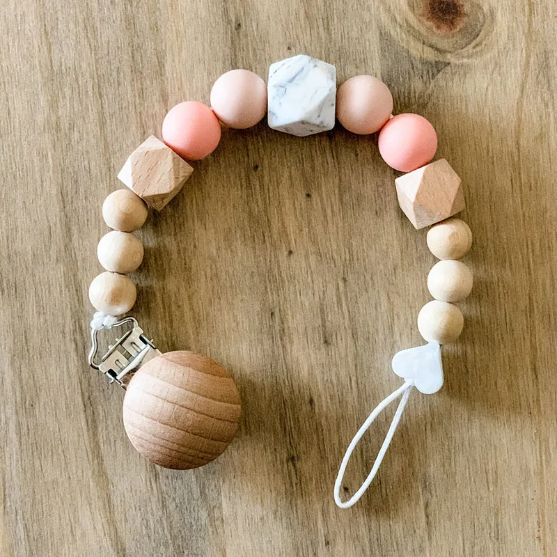 Hot Sale Wooden Silicone Beads Baby Teething Pacifier Clip Newborn Infant Nipple Chain Holder 
Hot Sale Wooden Silicone Beads Baby Teething Pacifier Clip Newborn Infant Nipple Chain Holder