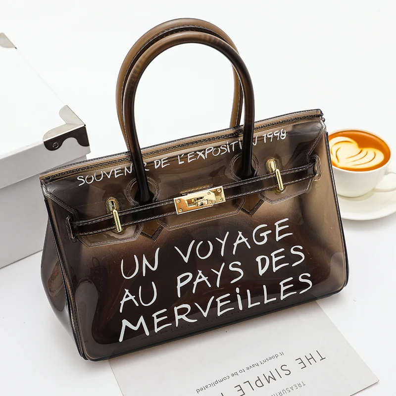 Transparent Jelly candy handba for women Fashion Pvc Beach Handbags summer color crossbody bag Transparent PVC Tote bag
Transparent Jelly candy handba for women Fashion Pvc Beach Handbags summer color crossbody bag Transparent PVC Tote bag