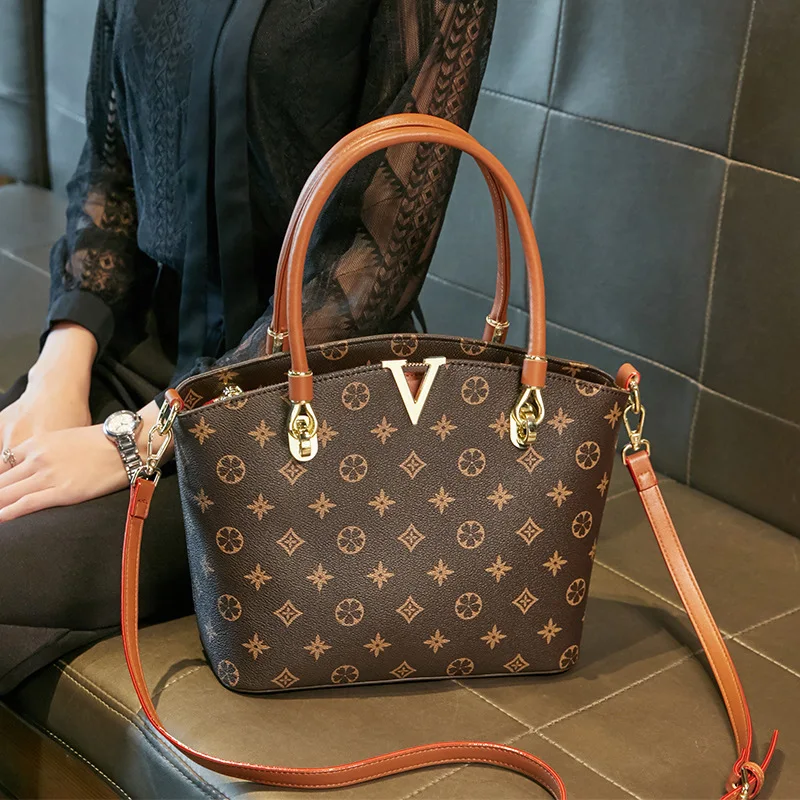 Women bag 2021 new fashion portable tote bag simple large capacity commuting shoulder bag ladies handbags
Women bag 2021 new fashion portable tote bag simple large capacity commuting shoulder bag ladies handbags