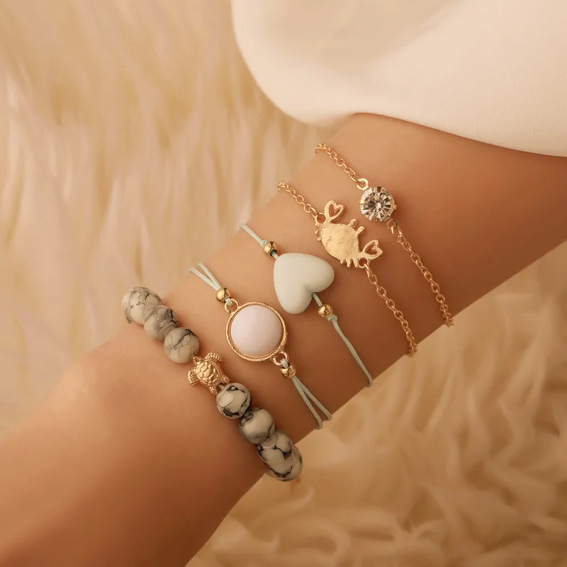 Hot selling fashion jewelry women crab beach style gold turtle heart bead 5pcs set charm bracelet crystal
Hot selling fashion jewelry women crab beach style gold turtle heart bead 5pcs set charm bracelet crystal