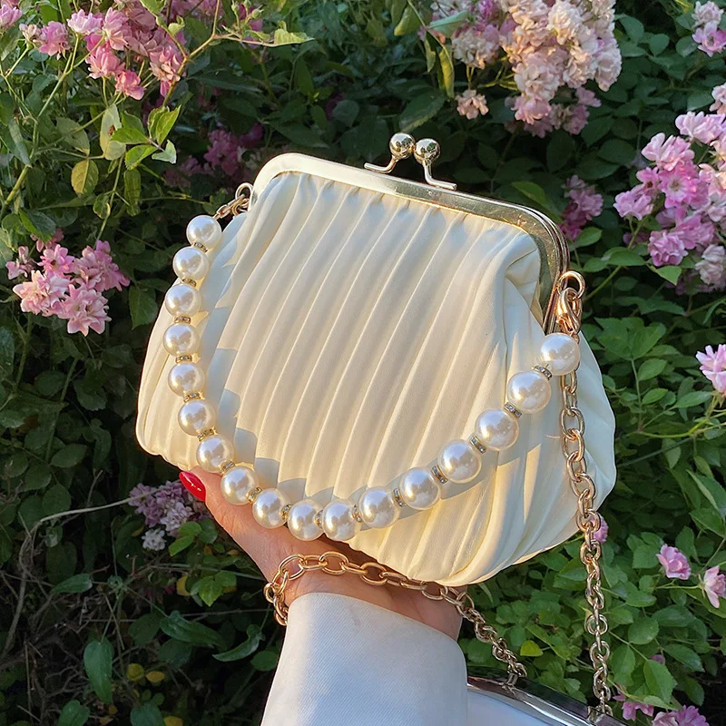 Pleated Shell bag Small Totes With Pearl Handle 2021 Summer New PU Leather Women's Designer Handbag Chain Shoulder Bag Clutch
Pleated Shell bag Small Totes With Pearl Handle 2021 Summer New PU Leather Women's Designer Handbag Chain Shoulder Bag Clutch