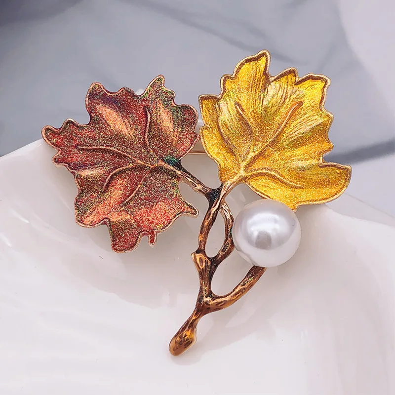 European Fashion Retro Maple Leaf with Peal Brooch Gold Plated Temperament Women's Brooch Jewelry, Gold (as the picture)
European Fashion Retro Maple Leaf with Peal Brooch Gold Plated Temperament Women's Brooch Jewelry, Gold (as the picture)
