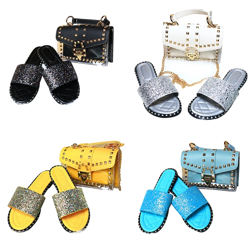 2021 Summer Ladies Elegant Clear Handbags And Shoe Slipper Women Fashion Matching Transparent Chain Rivet Purse And Sandals Set
2021 Summer Ladies Elegant Clear Handbags And Shoe Slipper Women Fashion Matching Transparent Chain Rivet Purse And Sandals Set