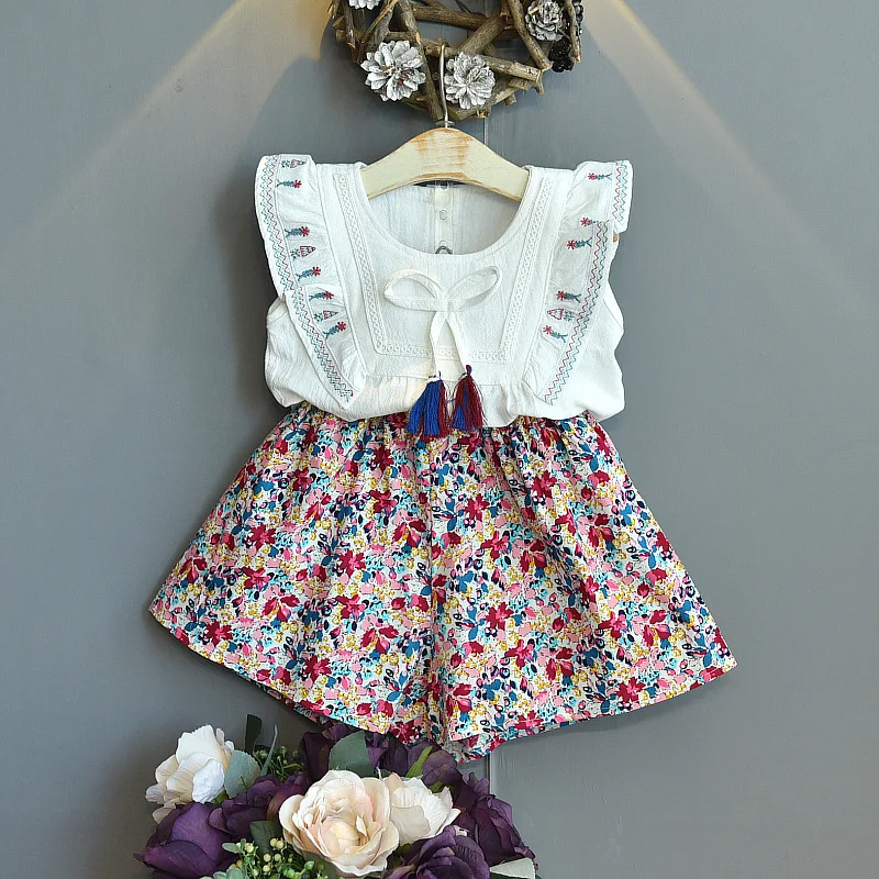 Girs Bow Clothes Suits 2021 Children Summer Korean Style White Tops And Flower Skirts Clothes Suits 2Pcs Kids Clothes
Girs Bow Clothes Suits 2021 Children Summer Korean Style White Tops And Flower Skirts Clothes Suits 2Pcs Kids Clothes