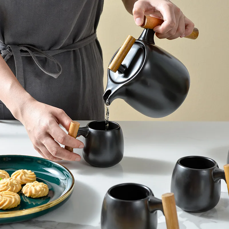 Nordic Designer Wood Handle Coffee Ceramic Tea Cup Set Coffee Cups Pots Set with Stainless Steel Stainer Gift Box Gift, Customized color
Nordic Designer Wood Handle Coffee Ceramic Tea Cup Set Coffee Cups Pots Set with Stainless Steel Stainer Gift Box Gift, Customized color