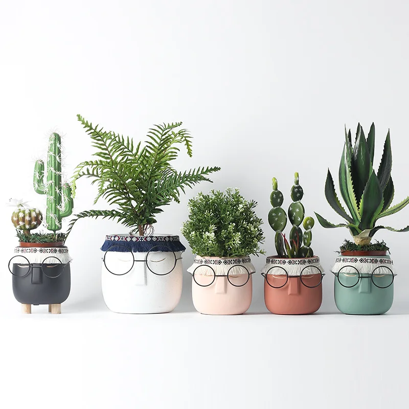 Wholesale face flower pot small indoor cute ceramic pots, As picture show 
Wholesale face flower pot small indoor cute ceramic pots, As picture show