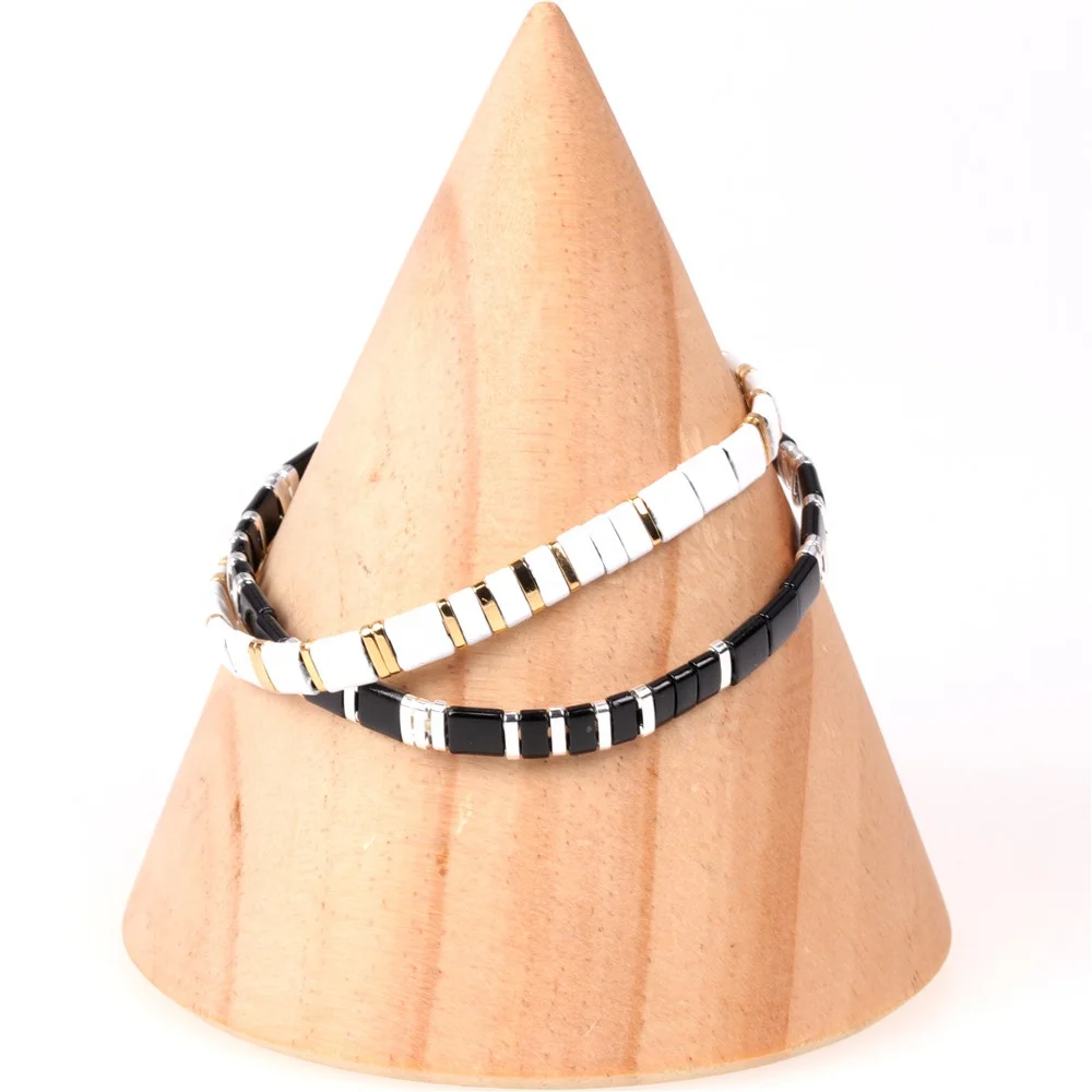 Trend spring and summer gold plated brazzales black and white color contrast stretch beading braided bracelet men
Trend spring and summer gold plated brazzales black and white color contrast stretch beading braided bracelet men