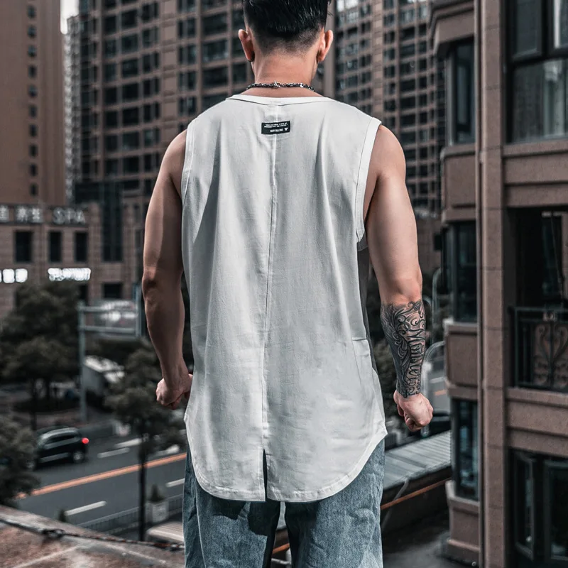 Fitness vest men's loose solid color summer thin cotton muscle sleeveless t-shirt running training suit
Fitness vest men's loose solid color summer thin cotton muscle sleeveless t-shirt running training suit