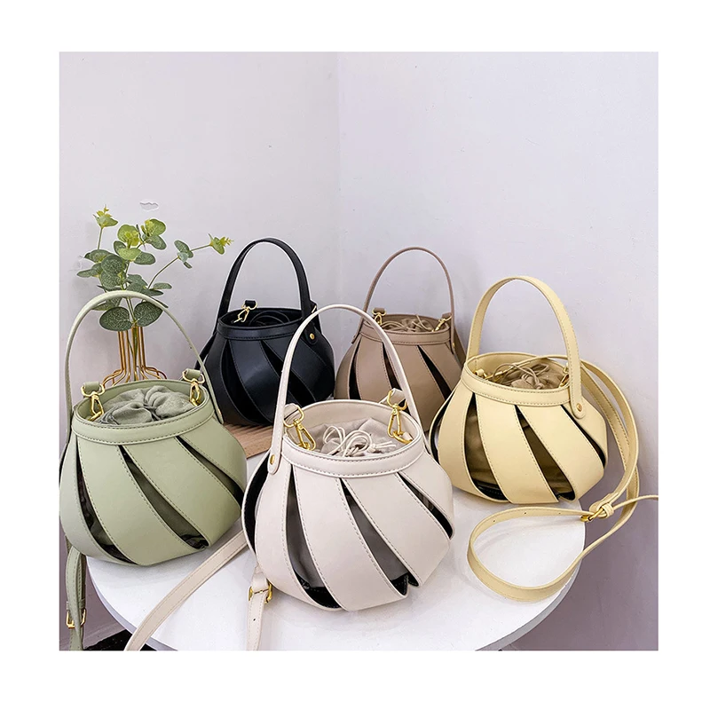 Designer PU Lantern Shape Shoulder Bags Summer Hollow Out Crossbody Tote Purses Simple Basket Hand Bags Women Bucket Handbags
Designer PU Lantern Shape Shoulder Bags Summer Hollow Out Crossbody Tote Purses Simple Basket Hand Bags Women Bucket Handbags