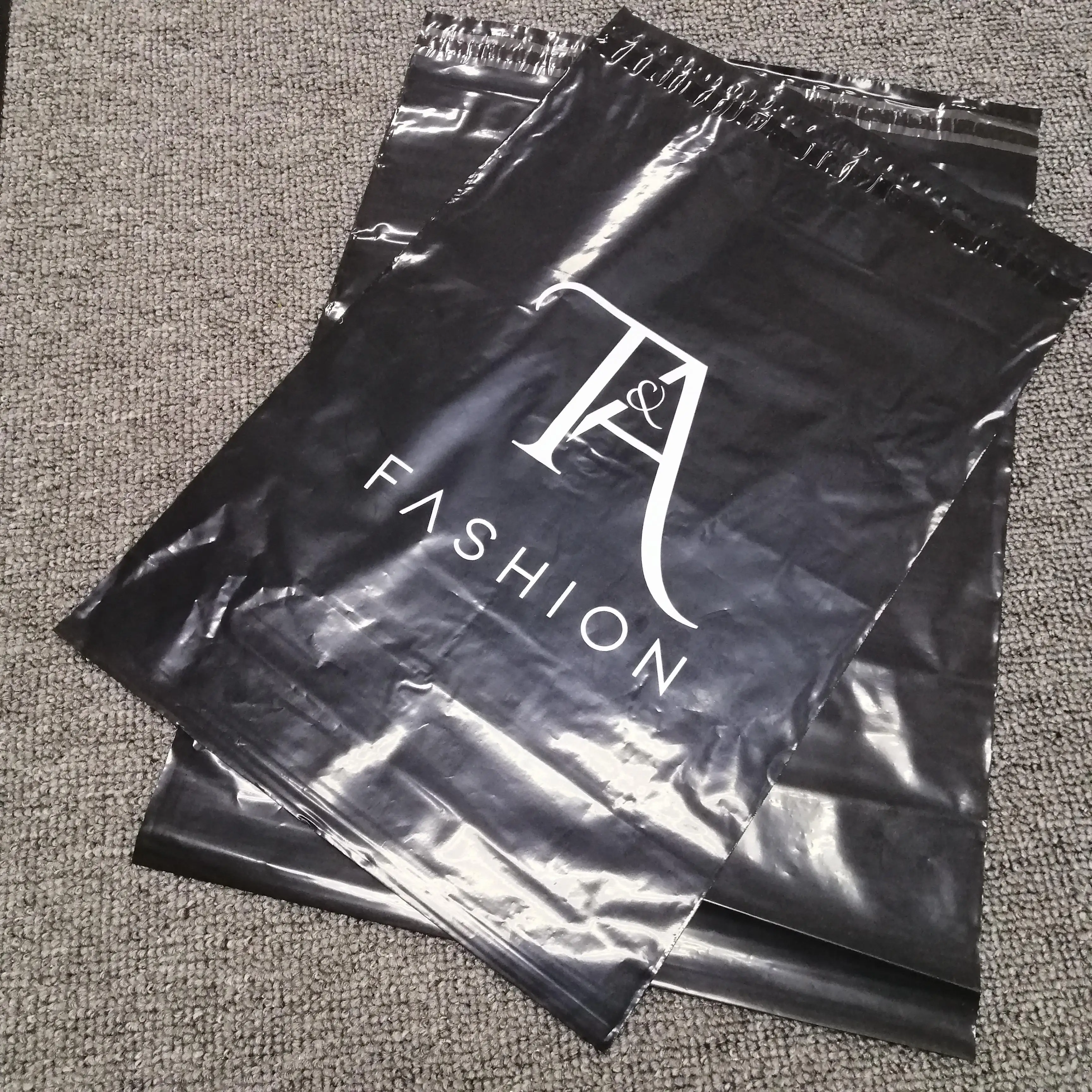 logo printed self adhesive tear-proof polyethylene shiny side black mailing bag mailers for clothing, Custom
logo printed self adhesive tear-proof polyethylene shiny side black mailing bag mailers for clothing, Custom
