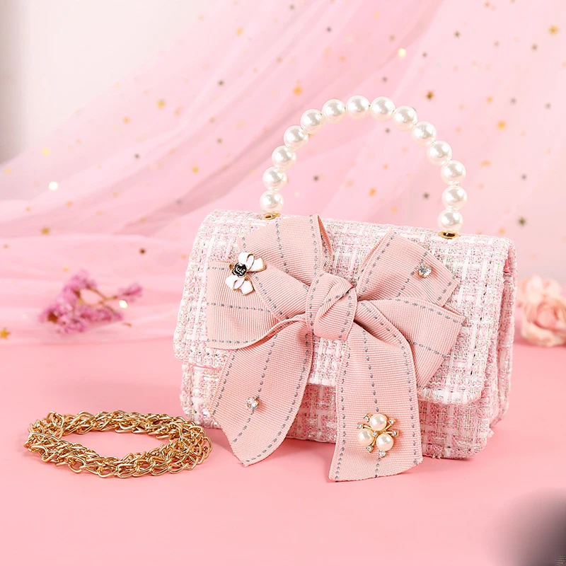Latest Princess style cute girl purse and handbags pearl handle bow kid Dinner Bag chains crossbody bags
Latest Princess style cute girl purse and handbags pearl handle bow kid Dinner Bag chains crossbody bags