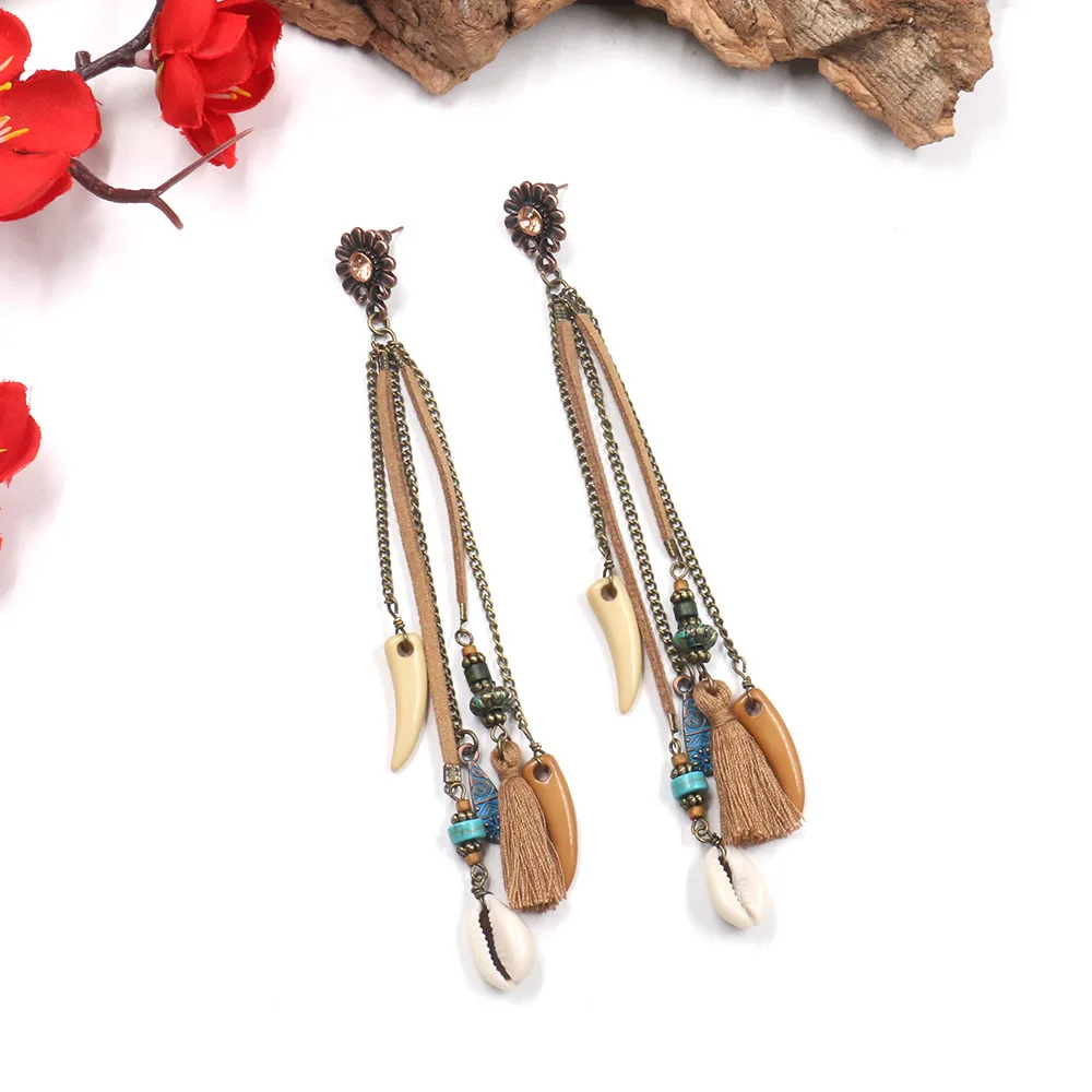 2022 New Arrival Geometric Leaf Sunflower Drop Earrings Ethnic Natural Shell Horns Long Tassel Earrings Bohemian Jewelry
2022 New Arrival Geometric Leaf Sunflower Drop Earrings Ethnic Natural Shell Horns Long Tassel Earrings Bohemian Jewelry