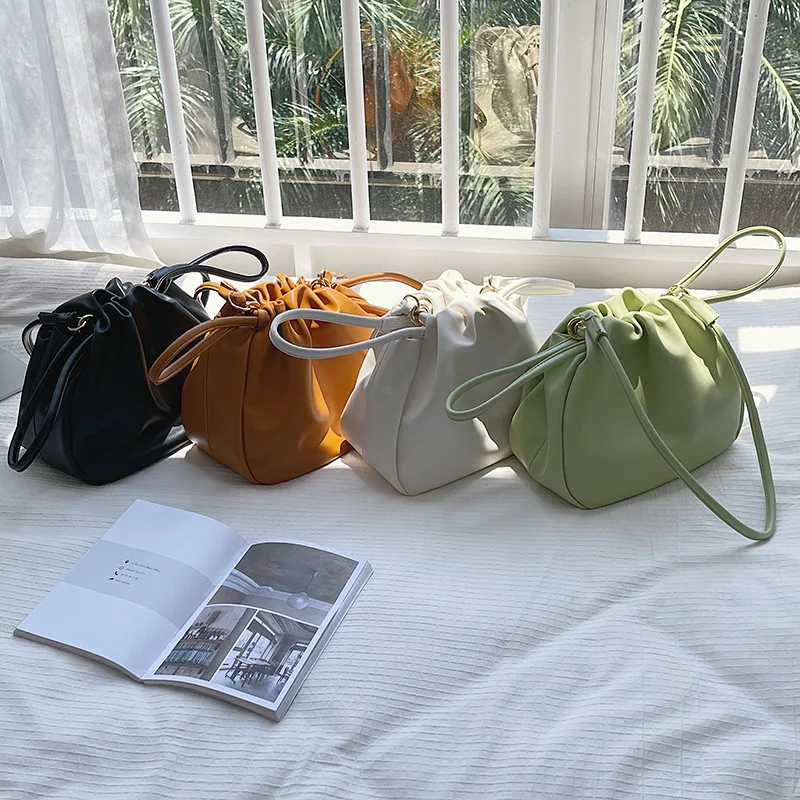 Korean women hand bag new solid color shoulder bag fashion trend handbag soft leather pull rope pleated small square handbag
Korean women hand bag new solid color shoulder bag fashion trend handbag soft leather pull rope pleated small square handbag