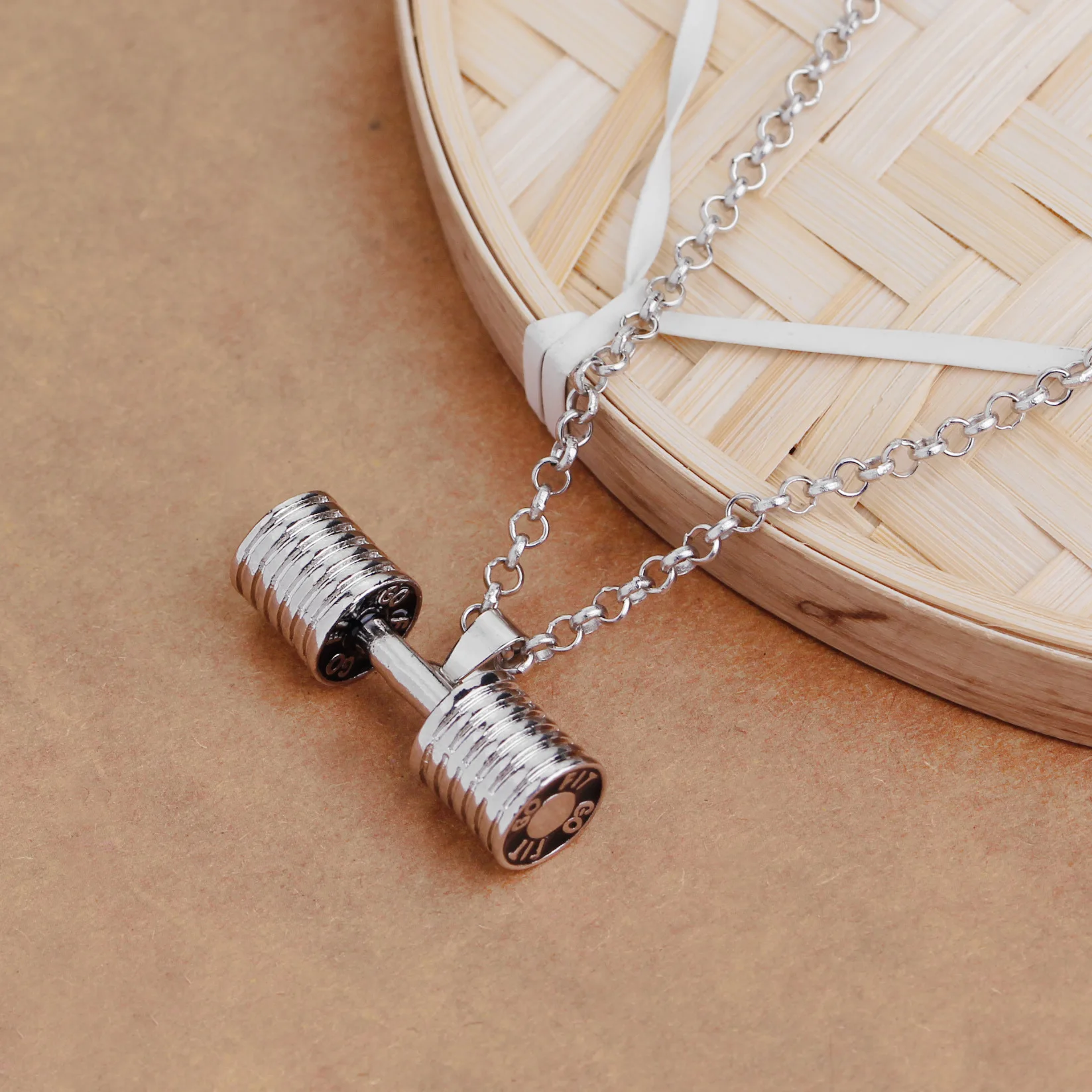 Popular European and American style sports fitness Department dumbbell Necklace Fashion barbell couple pendant autumn and winter
Popular European and American style sports fitness Department dumbbell Necklace Fashion barbell couple pendant autumn and winter