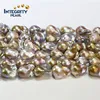 /product-detail/15x20mm-aa-large-fireball-nucleated-baroque-purple-natural-baroque-freshwater-pearl-strand-62369328069.html