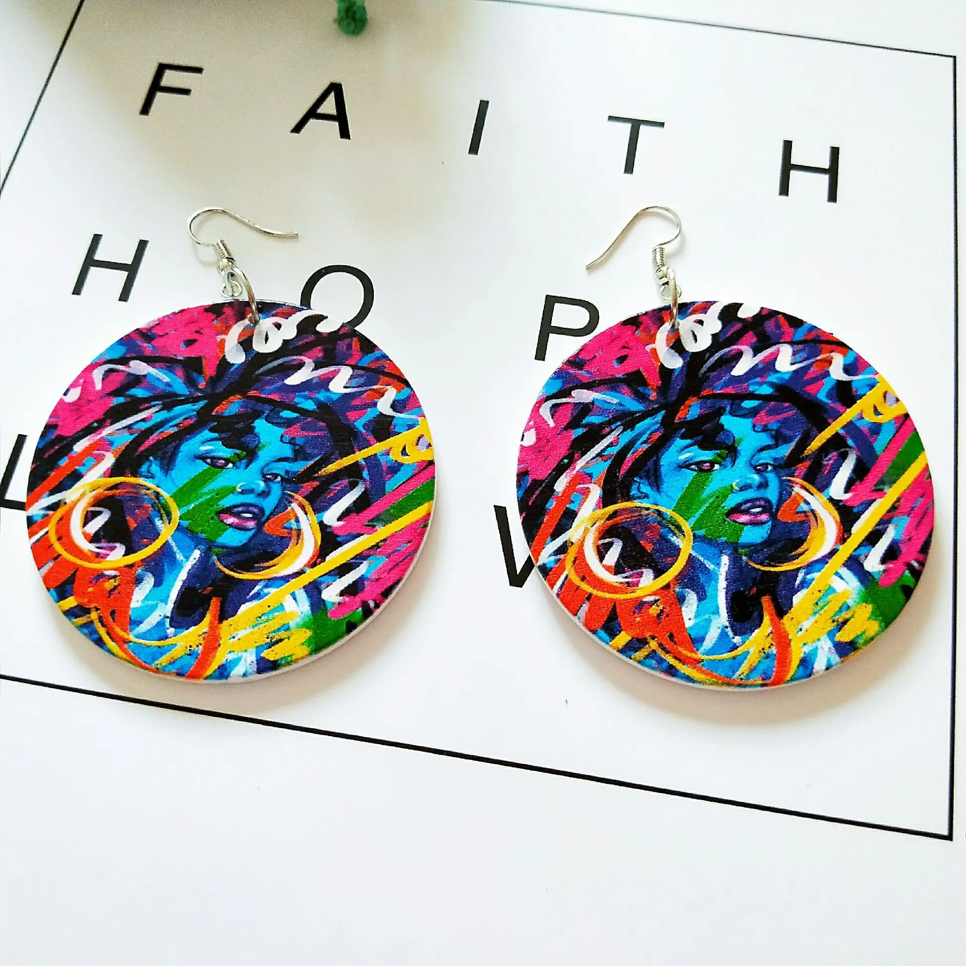 2021 Wholesale Exaggerated Colorful Printed African Women Head Wooden Earrings African Cool Cartoon Women Wood Drop Earring
2021 Wholesale Exaggerated Colorful Printed African Women Head Wooden Earrings African Cool Cartoon Women Wood Drop Earring