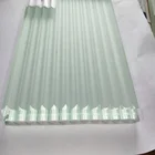 Low iron reeded glass for wall cladding