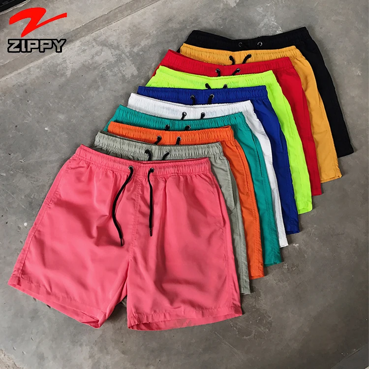 Wholesale stock beach shorts polyester men running shorts mesh lining short pants for men
Wholesale stock beach shorts polyester men running shorts mesh lining short pants for men