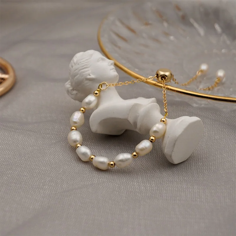 Simple elegant women jewelry brass 14K gold plated natural freshwater pearl pull design charm bracelets, As the pic show
Simple elegant women jewelry brass 14K gold plated natural freshwater pearl pull design charm bracelets, As the pic show