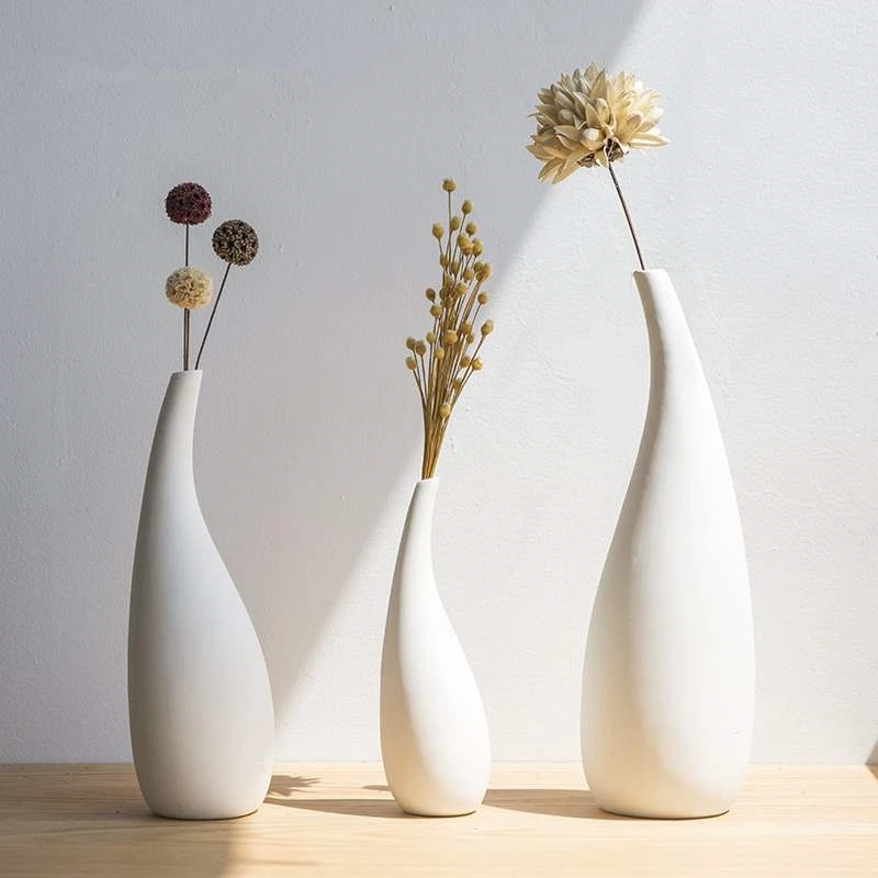 Modern vases white matte porcelain handmade wedding bar interior and exterior decorative vases
Modern vases white matte porcelain handmade wedding bar interior and exterior decorative vases