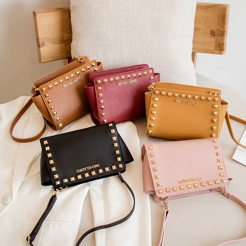 2021 new summer lady's purse punk rivet fashion handbag messenger bag one shoulder handbag
2021 new summer lady's purse punk rivet fashion handbag messenger bag one shoulder handbag