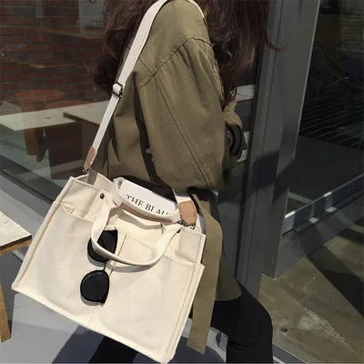 New large capacity, minimalist, one-shoulder canvas bag with many pockets solid color tote bag for ladies, White only
New large capacity, minimalist, one-shoulder canvas bag with many pockets solid color tote bag for ladies, White only