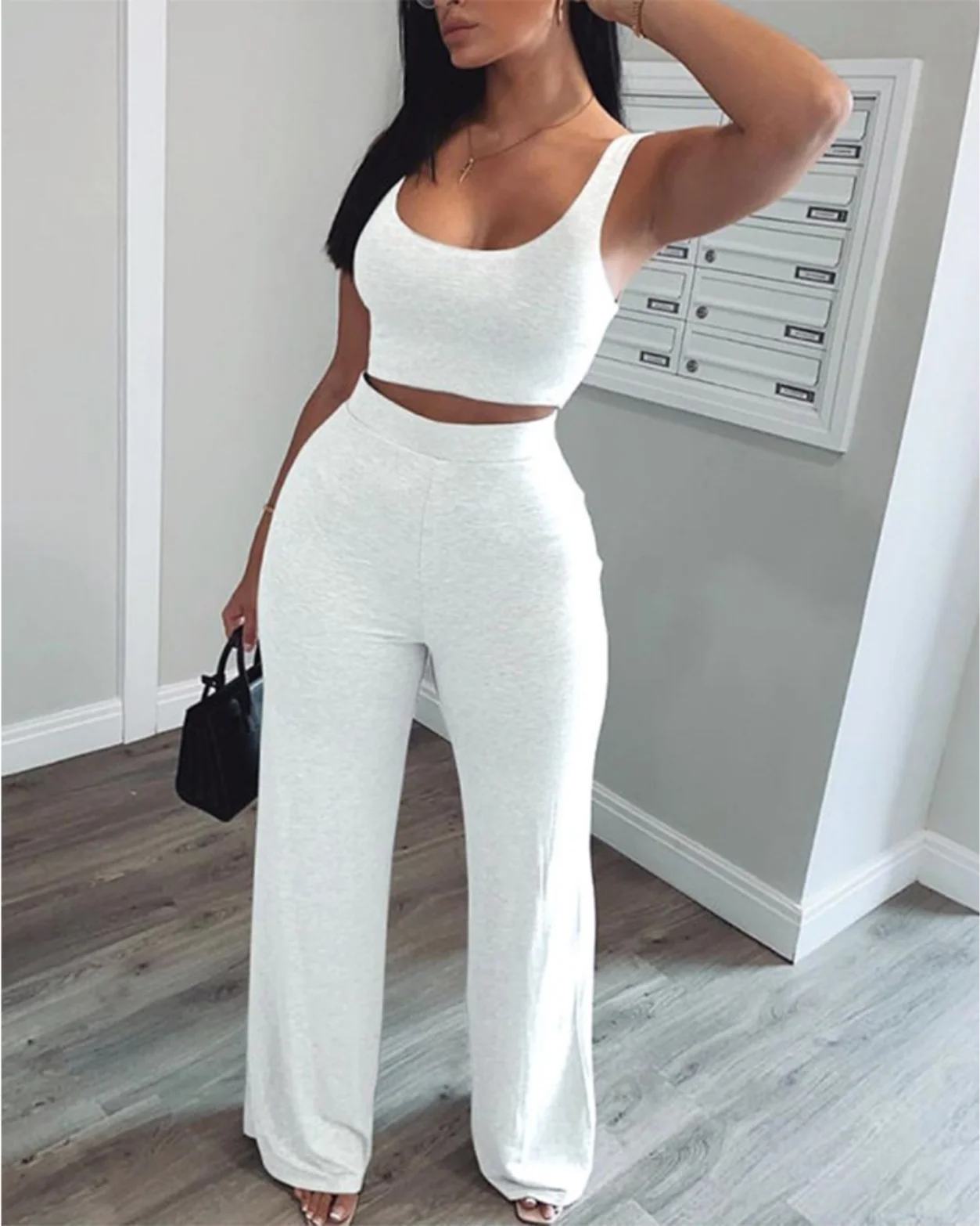 2021 hot summer fashion women's wear Vest solid High waist Wide leg pants suit casual sport 2 piece set
2021 hot summer fashion women's wear Vest solid High waist Wide leg pants suit casual sport 2 piece set