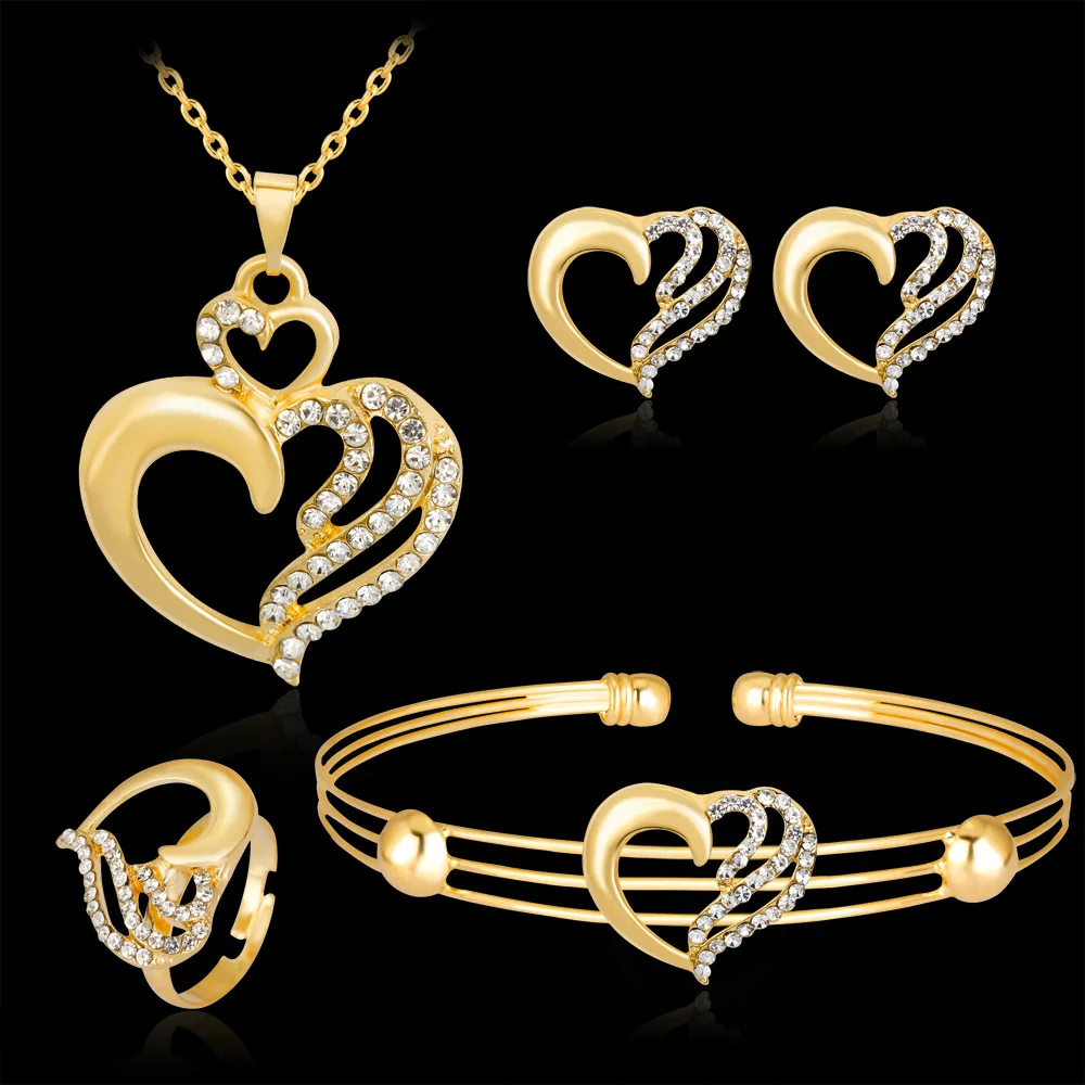 Love necklace bracelet Four-piece earrings Hollow out Diamond Necklace set for women
Love necklace bracelet Four-piece earrings Hollow out Diamond Necklace set for women