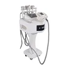 new arrival body slimming and fat reduction laser loss weight machine vacuum+cavitation+Vela shape
