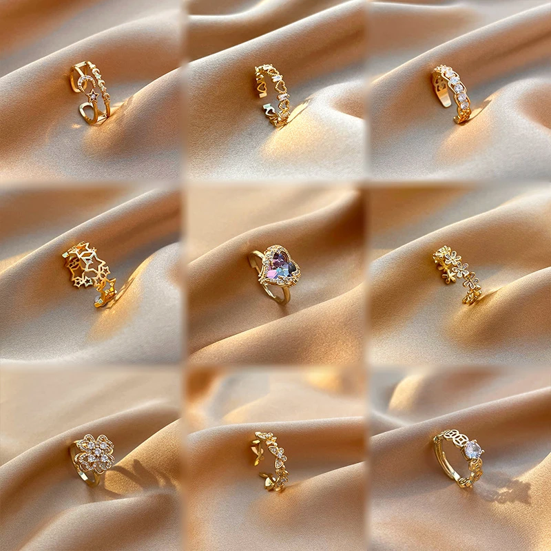 Korean copper zircon heart Rotating Ring gold four-leaf clover hollow star moon shape open adjustable women wedding ring
Korean copper zircon heart Rotating Ring gold four-leaf clover hollow star moon shape open adjustable women wedding ring