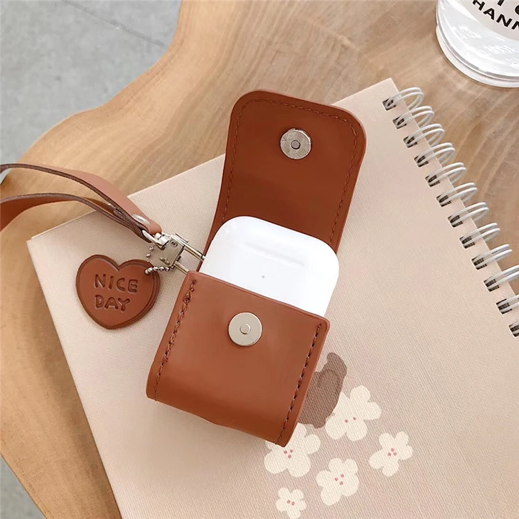 PU Leather Charging Case Cover with a Wrist Strap for Apple Airpods 1/2 Charging Case, Brown
PU Leather Charging Case Cover with a Wrist Strap for Apple Airpods 1/2 Charging Case, Brown