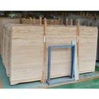 Honed yellow wood grain marble slab