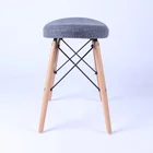 Modern plastic covered fabric chair with wood leg for living room