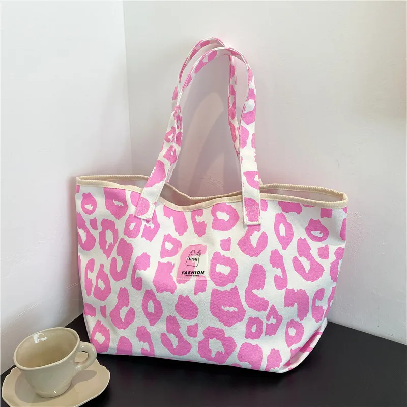 2021 New pink leopard print lettering button canvas shoulder bag wholesale girl's purse phone handbags, 4 colors
2021 New pink leopard print lettering button canvas shoulder bag wholesale girl's purse phone handbags, 4 colors