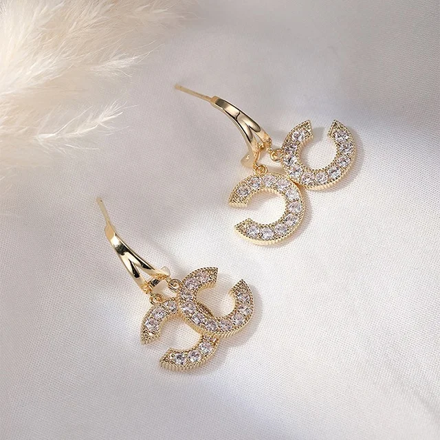 ADELANTE New Fashion wholesale earrings romantic alphabet Double CC Earrings, Gold 
ADELANTE New Fashion wholesale earrings romantic alphabet Double CC Earrings, Gold