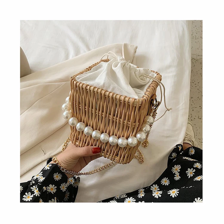 Summer Bali Handmade Woven Rattan Bag Beach Shoulder Crossbody Bags Pearl Handle Picnic Bags Drawstring Travel Holiday Handbags
Summer Bali Handmade Woven Rattan Bag Beach Shoulder Crossbody Bags Pearl Handle Picnic Bags Drawstring Travel Holiday Handbags