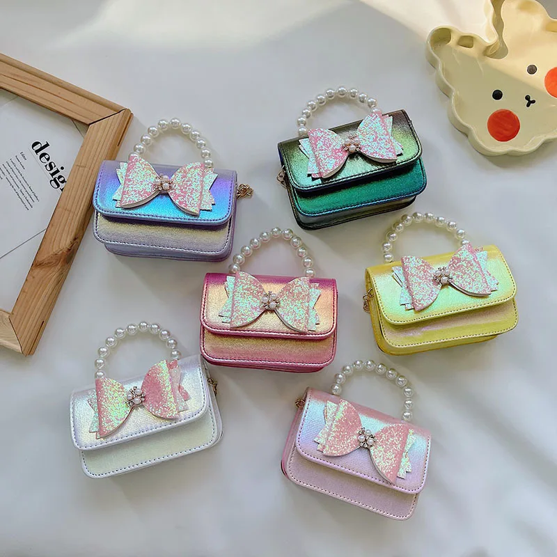 New Fashion Girls Chain bowknot Messenger Bag Kids HandBag Cute Bow Shoulder Bag Little Girl purse Mini Pearl small hand bags, 6 colors
New Fashion Girls Chain bowknot Messenger Bag Kids HandBag Cute Bow Shoulder Bag Little Girl purse Mini Pearl small hand bags, 6 colors