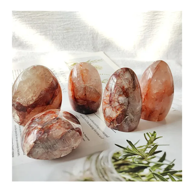 Wholesale natural hand carved freeform displays red fire quartz standing stones for decorations
Wholesale natural hand carved freeform displays red fire quartz standing stones for decorations