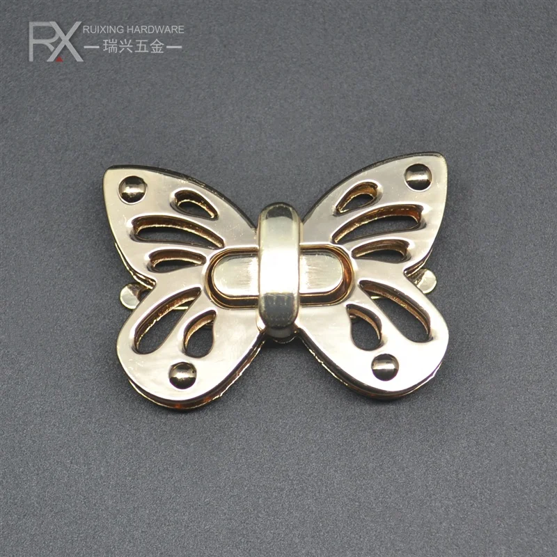 Custom butterfly bag lock metal handbag hardware handle zinc alloy handbag lock buckles bag accessories for handbag luggage 
Custom butterfly bag lock metal handbag hardware handle zinc alloy handbag lock buckles bag accessories for handbag luggage