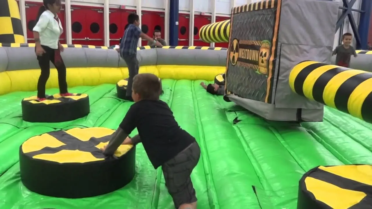 Person Toxic Meltdown Jumper Inflatable Wipe Out Machine Challenge