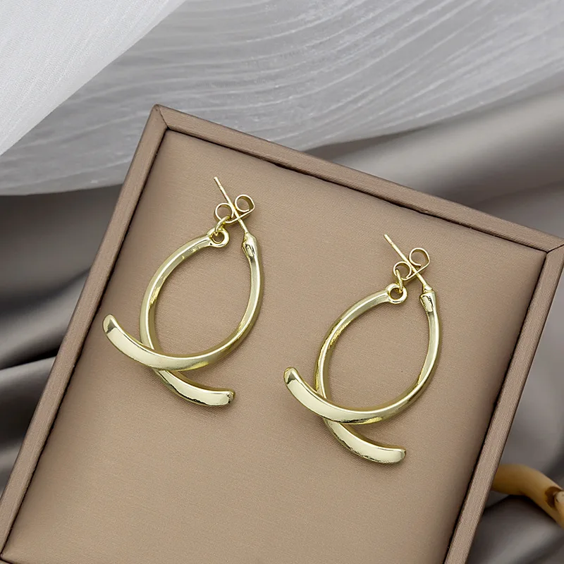 Latest design silver needle cross line earrings hyperbolic arc geometry back hanging earrings
Latest design silver needle cross line earrings hyperbolic arc geometry back hanging earrings