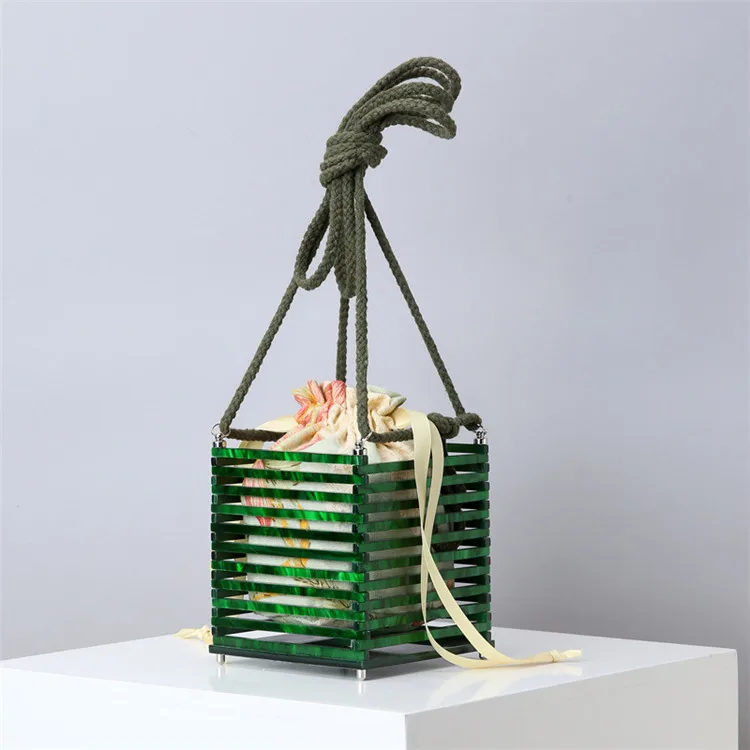 019 new European and American woven handbags fashion Designer hollow out cage bag messenger handbag, Green white amber color
019 new European and American woven handbags fashion Designer hollow out cage bag messenger handbag, Green white amber color