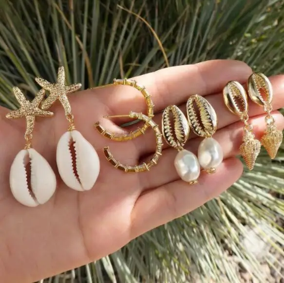 Artilady Summer Beach Cowrie Shell Earrings Stud Earring set jewelry Pearl Gold Shell Drop Earrings For Women, Picture shows
Artilady Summer Beach Cowrie Shell Earrings Stud Earring set jewelry Pearl Gold Shell Drop Earrings For Women, Picture shows