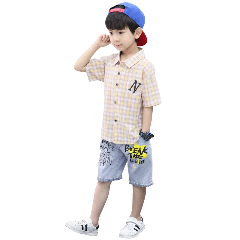 Boys summer checkered short-sleeved shirt cartoon pattern five-point denim shorts 2021 new two-piece suit
Boys summer checkered short-sleeved shirt cartoon pattern five-point denim shorts 2021 new two-piece suit