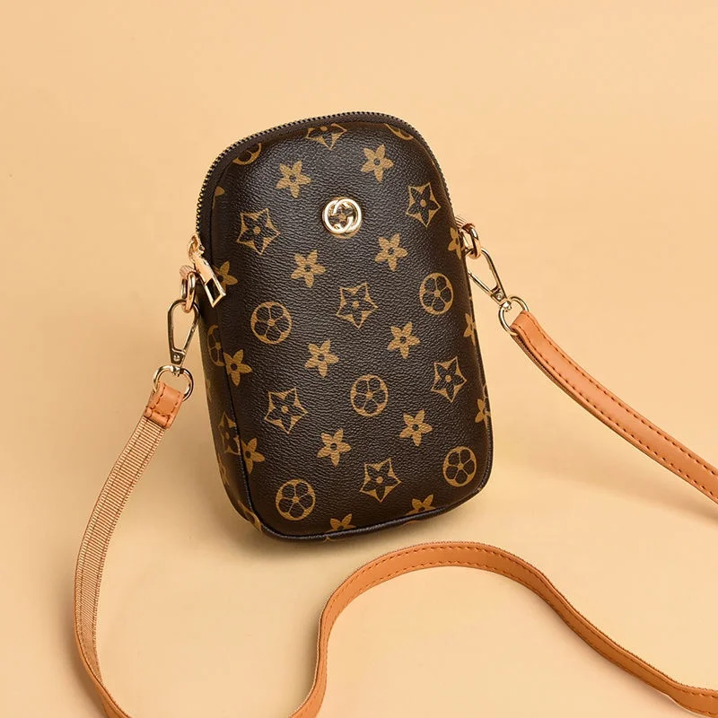 2021 factory price new super cute mini shell phone bag shoulder slung lady chain bag letter printing brand design purse, Brown,gray
2021 factory price new super cute mini shell phone bag shoulder slung lady chain bag letter printing brand design purse, Brown,gray