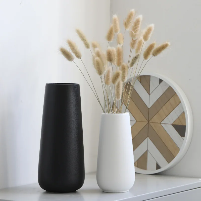 factory hot sale Simple European retro frosted wide-mouth decoration matte black and white ceramic vase
factory hot sale Simple European retro frosted wide-mouth decoration matte black and white ceramic vase